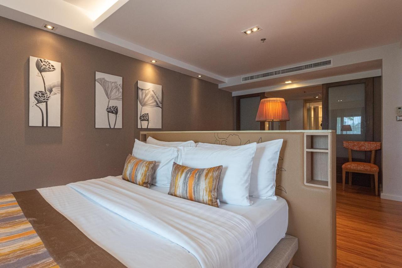 Summit Windmill Golf Suite Hotel At Suvarnabhumi Bangkok Bagian luar foto A bedroom at the hotel