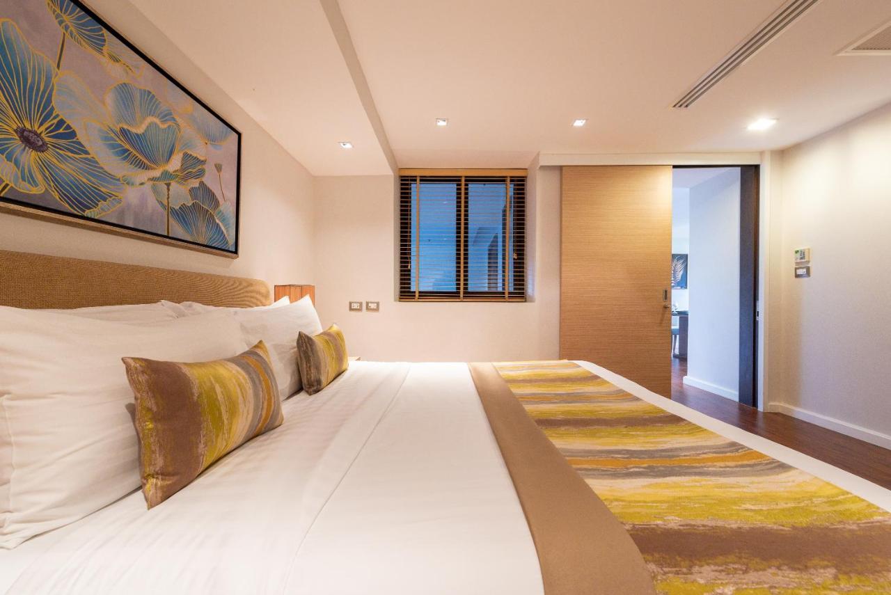 Summit Windmill Golf Suite Hotel At Suvarnabhumi Bangkok Bagian luar foto A bedroom at the hotel